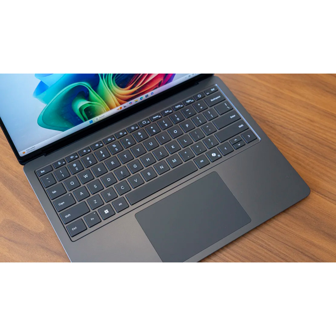 لپتاپ مایکروسافت مدل Surface Laptop 7 Copilot Plus PC با پردازنده Snapdragon X Plus، رم LPDDR5x 16GB، حافظه SSD با ظرفیت 256GB، نمایشگر لمسی 13.8 اینچ PixelSense Flow با نرخ بهروزرسانی 120Hz، دارای نور پسزمینه کیبورد - Image 12